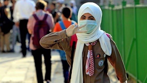 A student attends the first day of school on Tuesday while wearing a protective mask and gloves in Amman amid the ongoing coronavirus pandemic. — Courtesy photo