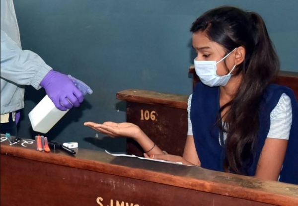 India logged a daily rise of 89,706 coronavirus infections on Wednesday, taking its second-highest tally globally to over 4.3 million cases as the government said it would reopen schools for students in upper grades after more than five months of closure.