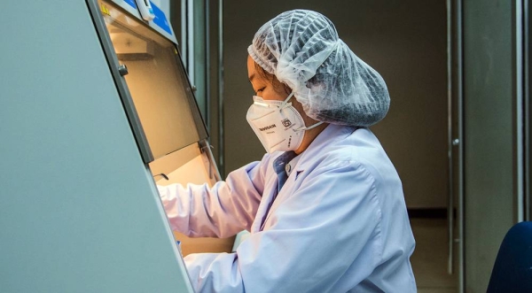 
A laboratory technician works at a health and science center in Bangkok, Thailand. It is a WHO Collaborating Centre for research and training on viral zoonoses. — courtesy WHO/P. Phutpheng