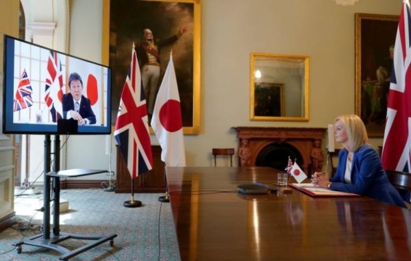 Liz Truss speaking to Japan's Minister for Foreign Affairs Toshimitsu Motegi at the Department for International Trade. — courtesy Andrew Parsons/Crown Copyright/No10 Downing Street/PA Wire.