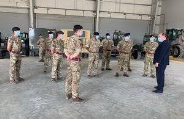 British Defense Secretary Ben Wallace speaks to members of the Armed Forces based at the strategic Omani port of Duqm. — Courtesy photo