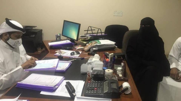 Awatif Al-Sahav filing her candidature for the presidency of Citadel Club in the northern Al-Jouf region. — Okaz photo
