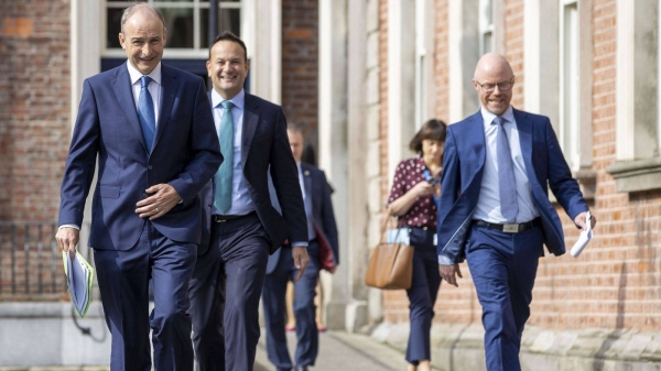 Irish Prime Minister Micheal Martin, Deputy Prime Minister Leo Varadkar and Health Minister Stephen Donnelly, outside the parliament building, Tuesday. — Courtesy photo
