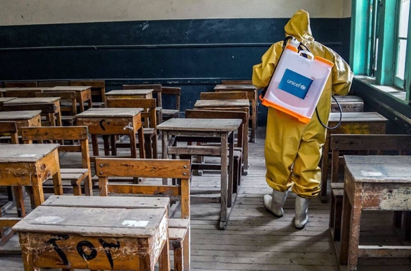 Students at a primary school in Phnom Penh, Cambodia, on the second day after their school reopened. The students, teachers and school administrators wear masks while at the school and maintain physical distancing. — courtesy UNICEF/Seyha Lychheang