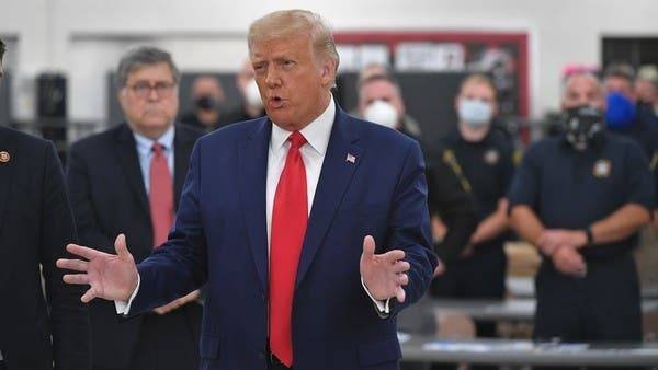 US President Donald Trump speaks with officials at Mary D. Bradford High School in Kenosha, Wisconsin, earlier this month. — File photo
