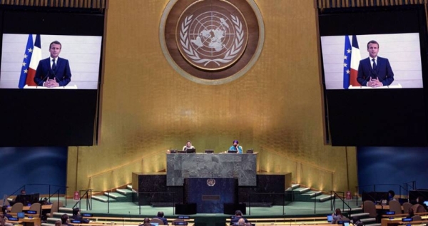 President Emmanuel Macron (on screen) of France addresses the General Debate of the General Assembly’s seventy-fifth session. — courtesy UN Photo/Manuel Elias