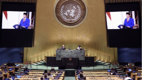 
President Joko Widodo (on screen) of Indonesia addresses the General Debate of the General Assembly’s seventy-fifth session. — courtesy UN Photo/Loey Felipe