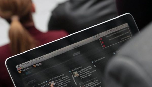 
File photo shows a person browsing through social media on their laptop computer (content blurred to protect privacy). — courtesy World Bank/Simone D. McCourtie