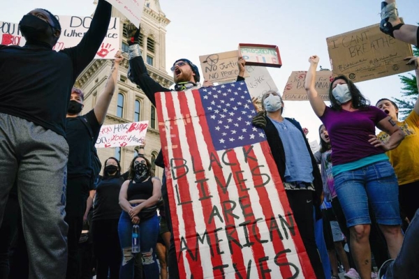 File photo of people protesting the deaths of Breonna Taylor by Louisville police and George Floyd by Minneapolis police, in Louisville, Kentucky, US.