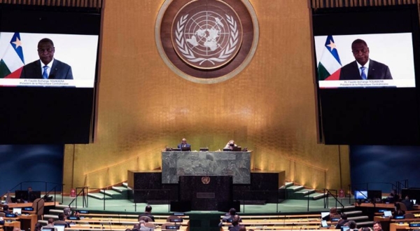 
Faustin Archange Touadera (on screen) of the Central African Republic addresses the general debate of the General Assembly’s seventy-fifth session. — courtesy UN Photo/Evan Schneider