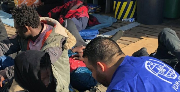 
Migrants who have been returned to shore in Libya after attempting to cross the sea to Europe are supported by aid workers from the IOM. — courtesy IOM Libya