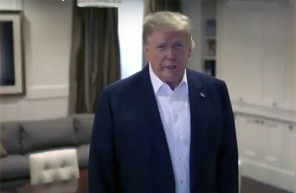 Donald Trump has been criticized for taking a drive to wave at cheering supporters outside the hospital where he is being treated for coronavirus.