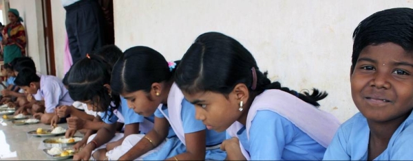File photo shows children in India eating micronutrient enriched food as part of a WFP program. — courtesy WFP/Isheeta Sumra