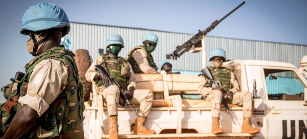 Peacekeepers serving with the UN's Multidimensional Integrated Stabilization Mission in Mali (MINUSMA) wear face masks while on patrol in this file picture. — Courtesy photo
