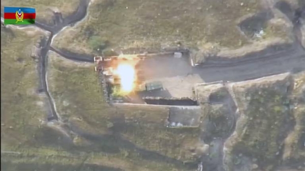 Video grab from the Azerbaijan Defense Ministry purporting to show an attack on an Armenian position.