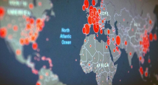 A data map shows the latest coronavirus case load across the world.