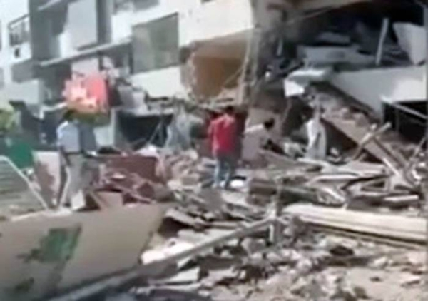A video grab of the aftermath of an explosion in a multi-story building near Maskan Chowrangi in Karachi's Gulshan-i-Iqbal area on Wednesday.