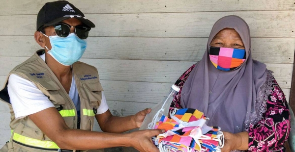 The UN Development Programme (UNDP) in Thailand and a local NGO arranged for the delivery of face masks to the ethnic community in Phuket province, located in the south of the country. — Courtesy photo