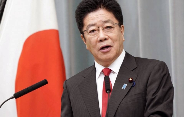 Japanese Chief Cabinet Secretary Katsunobu Kato speaks at a press conference in Tokyo on Monday. — courtesy Kyodo