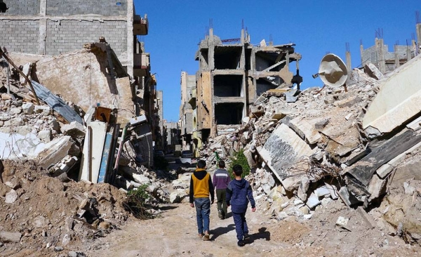 Boys walk through Benghazi Old Town in Libya. — courtesy OCHA/Giles Clarke