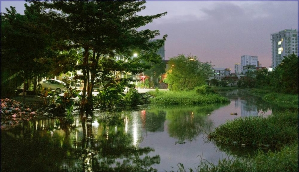 A sewage canal flows through the impoverished neighborhood of Stung Meachey, in the south of Phnom Penh, the capital of Cambodia. — courtesy UNICEF/Cristofolett