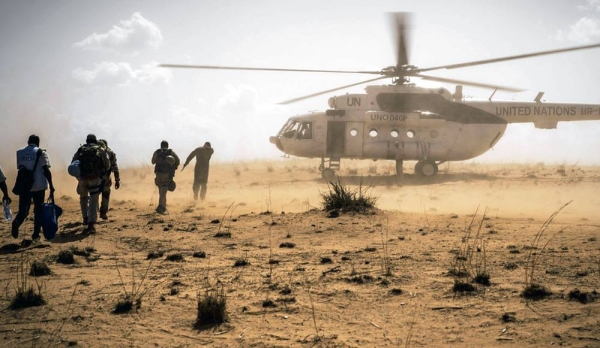 UN peacekeepers return to their helicopter following a mission in the Mopti region of Mali. — courtesy MINUSMA/Harandane Dicko