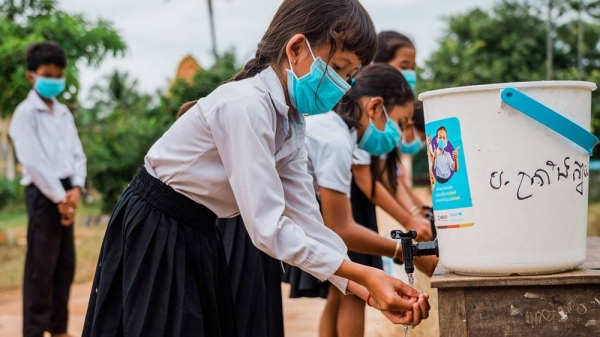 Children at a school in Cambodia wash their hands using a water facility provided by UNICEF. — courtesy UNICEF/Antoine Raab