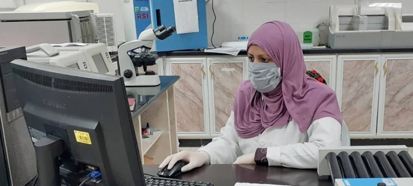 A researcher in a laboratory in Gaza analyzes data as part of efforts to fight the coronavirus. — Courtesy photo
