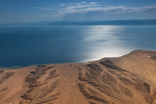 Built on the sands of fossil fuels but powered by green hydrogen, under an enviable climate, an enviably reliable sun to provide just inexhaustible solar energy, that city, that vision of NEOM represents a greener future for all of us,