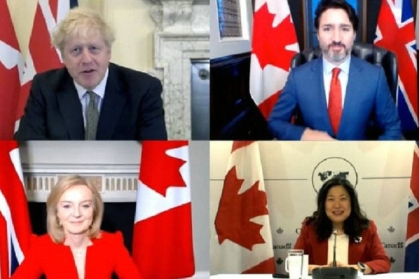 Prime Ministers Boris Johnson and Justin Trudeau, Trade Secretary Truss and Minister Ng announcing the trade deal. 