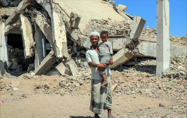 A man holds his child at the Al-Dhale’e Internally Displaced Persons (IDPs) Camp in Yemen. — courtesy YPN for UNOCHA