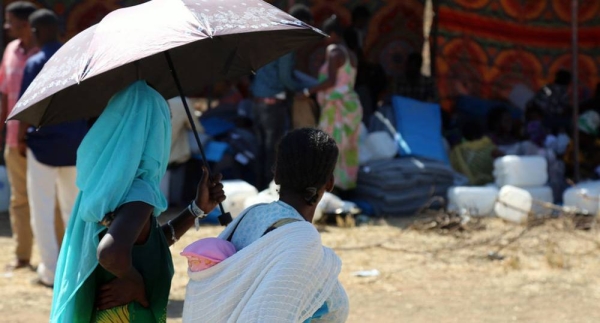 A woman receives health services at a transit point in Hamdayet, Sudan. — courtesy UNFPA Sudan/Sufian Abdul-Mout