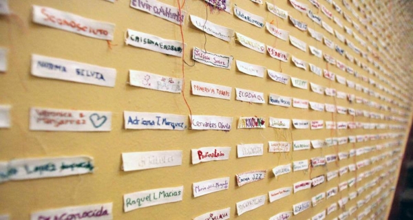 
Labels with the names of victims of femicide, as well as the 'unknown' represent the victims of femicide at an exhibition in Mexico. — courtesy UN Women/Alfredo Guerrero