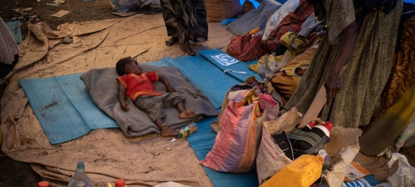 An Ethiopian refugee child sleeps on a mattress at a transit site in Hamdayet, Sudan, in this file photo. — Courtesy photo
