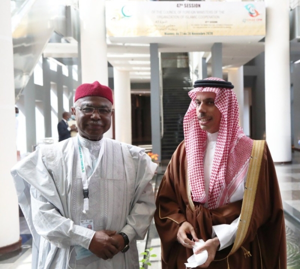 Saudi Foreign Minister Prince Faisal bin Farhan and Hussein Ibrahim Taha at the 47th session of the OIC Council of Foreign Ministers, in Niger on November 28, 2020. (Credit: @FaisalbinFarhan twitter)
