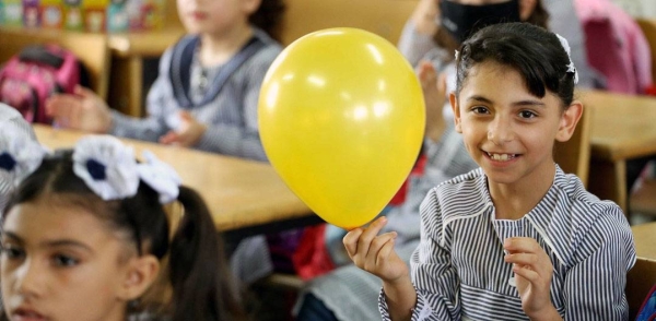 Palestine refugee students in a classroom at an UNRWA elementary co-ed school. — courtesy UNRWA/Khalil Adwan