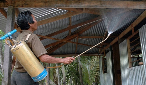 A child sleeps under an insecticide treated mosquito net for protection against malaria. — courtesy UNICEF/Colfs