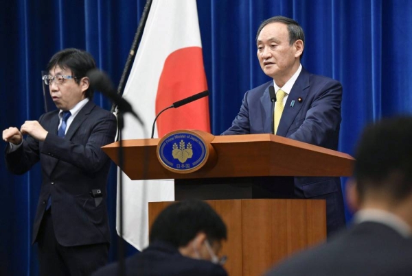 Japanese Prime Minister Yoshihide Suga speaks in Tokyo on Friday at a press conference marking the end of an extraordinary parliament session. — courtesy Kyodo