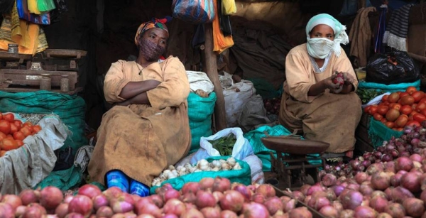 
Street vendors sell vegetables at a market in Addis Ababa, Ethiopia. — courtesy UNICEF/NahomTesfaye