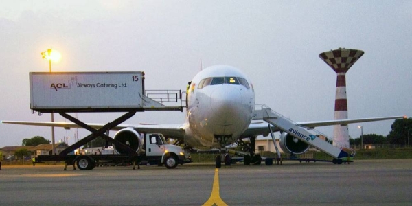 An aircraft being serviced at an airport in Ghana. — courtesy The World Bank/Arne Hoel