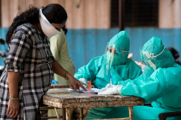 India recorded 31,521 new coronavirus cases, data from the health ministry showed on Thursday. The country has a total of 9.77 million infections but the daily tally has been slowly dropping since hitting a peak in September. Deaths rose by 412, with the total now 141,772. — WAM photo
