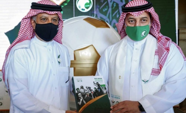 SAFF President Yasser Al-Mis'hal presents the official bid book to the AFC President Shaikh Salman Bin Ibrahim Al Khalifa for staging the 2027 AFC Asian Cup.