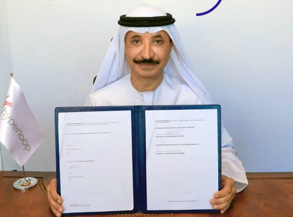 Faisal Al Bannai, secretary general of ATRC, with the MoU.