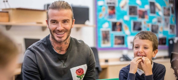 The former English football star and UNICEF Goodwill Ambassador David Beckham, pictured here at a school in London, UK, has supported the agency's work across the world. — Courtesy photo