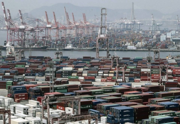 This file photo, taken June 4, 2020, shows stacks of import-export cargo containers at South Korea's largest seaport in Busan, 450 kms southeast of Seoul. — courtesy Yonhap
