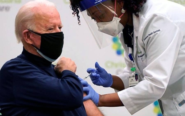 President-elect Joe Biden receives the COVID-19 vaccine jab at ChristianaCare's Christiana Hospital in Newark, Delaware. It was delivered by Nurse practitioner Tabe Mase.