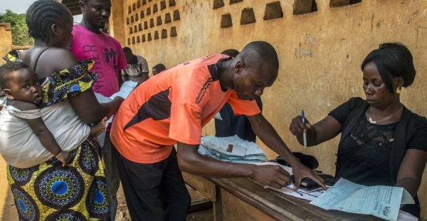 An official processes voter ID cards, ahead of the 27 December general elections in the Central African Republic. — courtesy MINUSCA/Hervé Serefio