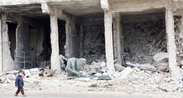 File photo shows a young child walks through the streets in Aleppo, Syria. — courtesy UNICEF/Grove Hermansen