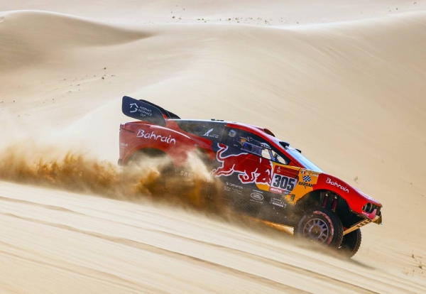Nasser Al Attiyah with Chairman of Saudi Auto Federation Prince Khalid Sultan Bin Abdullah Al Faisal during the Dakar Rally.