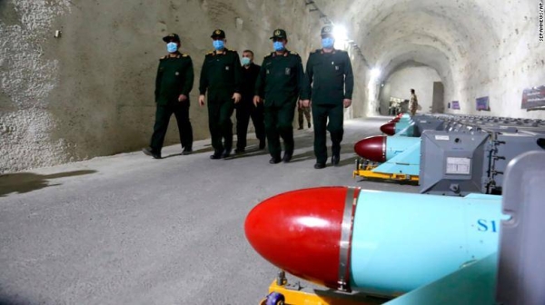 Iranian commanders walk past missiles at the base, in a photo released by Sepahnews, the website of the Revolutionary Guards. — Courtesy photo